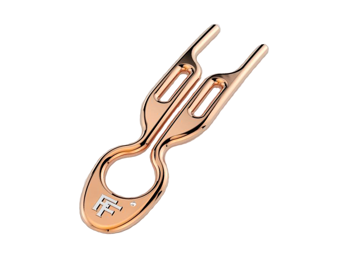 No.1 Hairpin by Fiona Franchimon in solid rose gold. With the FF logo in silver and a diamond next to it.
